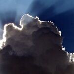 Silver-Lined Clouds of Venus and Neptune