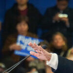 Hillary Clinton Hangs On