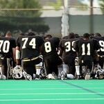 A Quarterback's Kneeling Protest